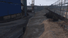 a screenshot of a video game shows a fenced in area with a project 1 watermark