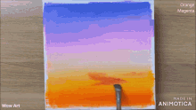 a person is painting a sunset with orange and magenta paints