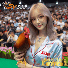 a woman is holding a rooster with sv388 museum bola written on her shirt