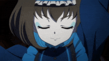 a close up of a girl 's face with closed eyes
