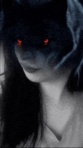a black and white photo of a woman with a wolf behind her