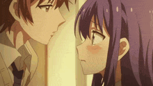a boy and a girl are looking at each other with their eyes closed