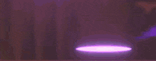 a person is standing in front of a large fireball in a video game