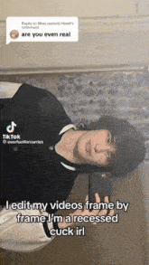 a man is taking a picture of himself with a tiktok reply