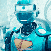 a robot in a superman costume with a helmet on