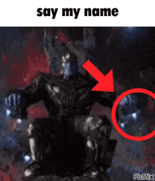a picture of thanos with a red arrow pointing to him and the words say my name below him