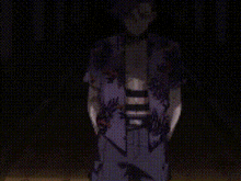 a man is wearing a purple shirt with a floral pattern .