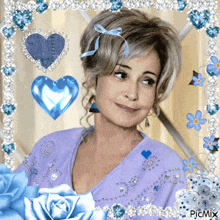 a woman in a purple shirt is surrounded by hearts and flowers