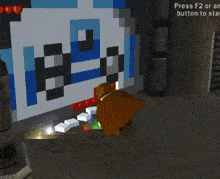 a screenshot of a video game that says press f2 or any button to start