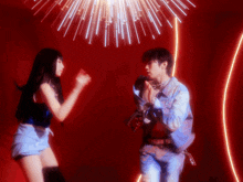 a man without a shirt is dancing with a woman