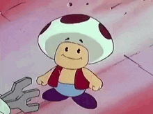 a cartoon character with a mushroom hat is smiling