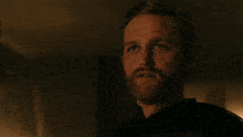 a blurry picture of a man talking to another man