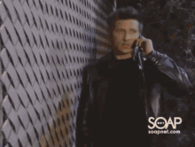soapnet.com shows a man playing with a baby and a young boy