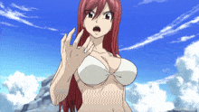 a woman with red hair and a white bikini is making a stop sign