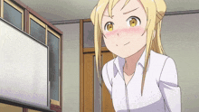 a girl with blonde hair and yellow eyes is standing in front of a whiteboard