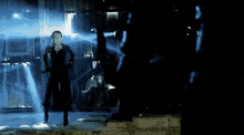 a shark is swimming in a dark room with a lot of smoke