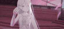 a white anime girl with long white hair is sitting on a red chair .