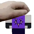 a pixelated image of a hand holding a purple and white item .