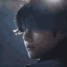 a close up of a person with dark hair