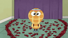 a cartoon peanut is surrounded by rose petals in a room