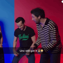 a man wearing a julius shirt is dancing