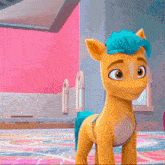 a yellow pony with a blue mane and tail