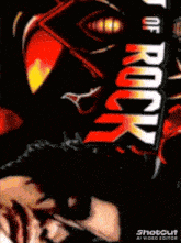 a poster for heavy of rock shows a skeleton and a woman