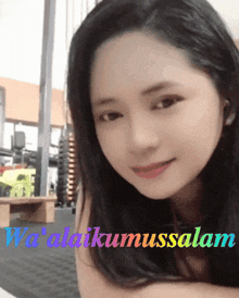 a picture of a woman with the words " wa ' alaikumussalam " on the bottom right