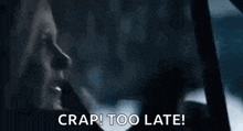a person is driving a car and says `` crap ! too late ! ''