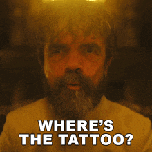 a man with a beard is asking where the tattoo