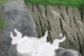 a cartoon drawing of a cliff with the letter p in the corner