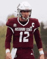 a football player wearing a missouri state jersey with the number 12 on it
