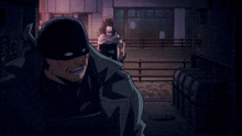 a man in a mask stands next to a woman in a black coat