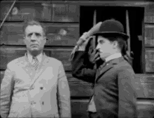 Charlie Chaplin Hit GIF - Charlie Chaplin Hit Laugh GIFs