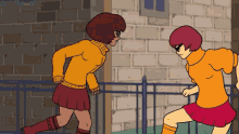 a cartoon of two girls standing next to each other with one wearing a yellow sweater