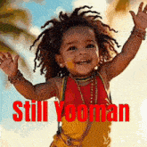 a little girl with dreadlocks is wearing a yellow and red outfit with the words still yooman above her
