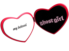 a heart shaped mirror that says ghost girl