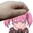 a hand is putting a pink haired anime girl 's head on a table .