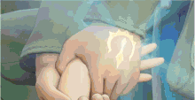 a person holding another person 's hand with a symbol on their palm