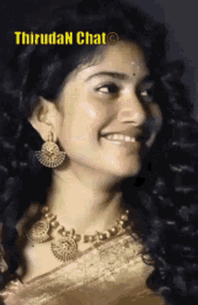 a close up of a woman wearing a necklace and earrings with the words thiruda n chat on the bottom