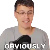 a man wearing glasses is talking into a microphone and says obviously