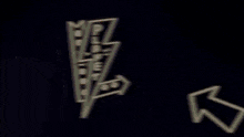 a neon sign that says planet with an arrow pointing to the left