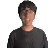 a man wearing glasses and a shirt that says nikolai