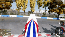 a screenshot of a video game shows a red white and blue vehicle on a race track