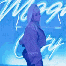a woman is standing in front of a neon sign that says mega city .