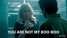 a netflix ad shows a woman pointing at a man and says you are not my boo-boo