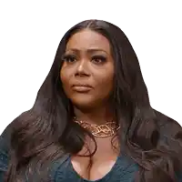a woman with long hair is wearing a necklace and a blue top .