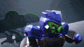 a cartoon character is wearing a robot costume and standing in a forest .