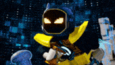 a blue and yellow robot with a smiley face on it