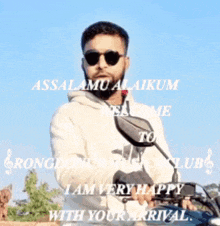 a man wearing sunglasses is riding a motorcycle and says " assalamualaikum " on the bottom